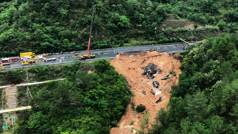 In this photo released by Xinhua News Agency, an aerial photo shows rescuers working at the site of a collapsed road section of the Meizhou-Dabu Expressway in Meizhou, south China's Guangdong Province, May 1, 2024. (Xinhua News Agency via AP)
