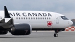 An Air Canada jet taxis at the airport, Wednesday, Nov. 15, 2023, in Vancouver. THE CANADIAN PRESS/Adrian Wyld