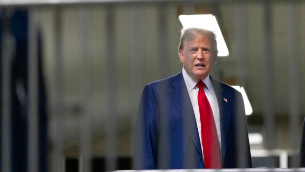 Former President Donald Trump talks to reporters as leaves the courtroom following the day's proceedings in his trial at Manhattan criminal court in New York, Tuesday, April 30, 2024. (Justin Lane/Pool Photo via AP)