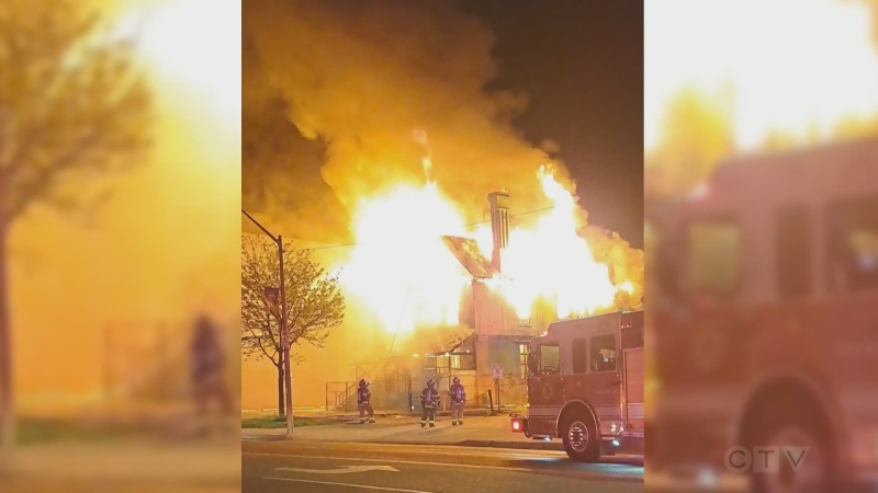 A vacant home called the 'Rainbow house' was engulfed in flames on Wednesday, May 2, 2024. (Submitted to CTV News)