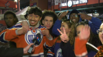 Edmonton Oilers fans celebrate the team advancing to Round 2 of the Stanley Cup playoffs after beating the L.A. Kings on May 1, 2024. (Sean McClune / CTV News Edmononton)