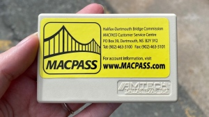 A hard-shelled MACPASS transponder is pictured.