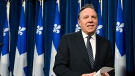 Quebec Premier Francois Legault leaves a news conference, Thursday, May 2, 2024 at the legislature in Quebec City. THE CANADIAN PRESS/Jacques Boissinot
