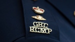 The RCMP logo is seen on the shoulder of a superintendent during a news conference, Saturday, June 24, 2023. (Source: THE CANADIAN PRESS/Adrian Wyld)