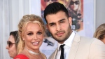 Britney Spears and Sam Asghari appear at the Los Angeles premiere of "Once Upon a Time in Hollywood" on July 22, 2019. (Photo by Jordan Strauss/Invision/AP)
