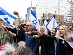 Pro-Israel demonstrators protest outside the closed Roddick gates, where a pro-Palestinian encampment is set up on McGill University's campus, in Montreal, Thursday, May 2, 2024. (Christinne Muschi, The Canadian Press)