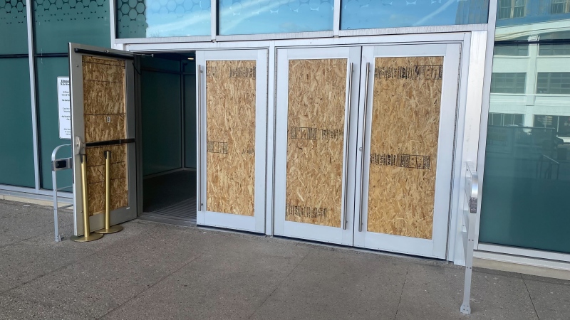 Some Edmonton Law Courts glass panes were smashed with an axe on Wednesday, May 1, 2024. (Galen McDougall/CTV News Edmonton)