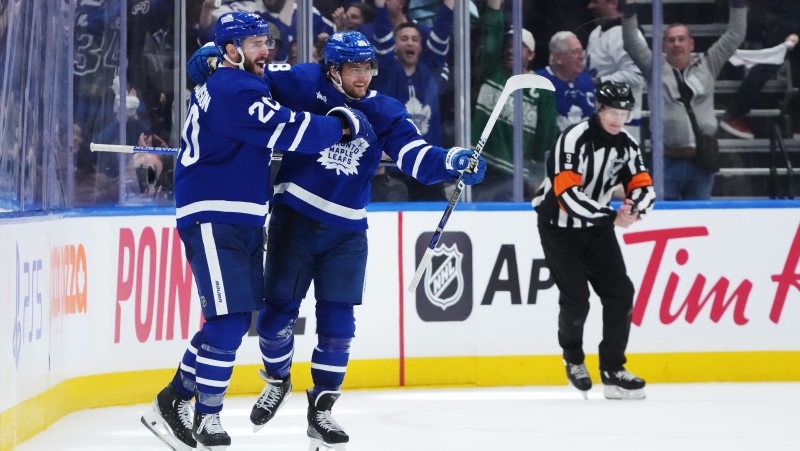 Toronto Maple Leafs' William Nylander (88) celebrates his goal against the Boston Bruins with Joel Edmundson (20) during third period action in Game 6 of an NHL hockey Stanley Cup first-round playoff series in Toronto on Thursday, May 2, 2024. THE CANADIAN PRESS/Nathan Denette