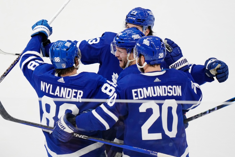 Toronto Maple Leafs' William Nylander (88) celebrates his goal against the Boston Bruins with Morgan Rielly (44), Matthew Knies (23) and Joel Edmundson (20) during third period action in Game 6 of an NHL hockey Stanley Cup first-round playoff series in Toronto on Thursday, May 2, 2024. THE CANADIAN PRESS/Frank Gunn