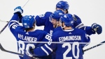 Toronto Maple Leafs' William Nylander (88) celebrates his goal against the Boston Bruins with Morgan Rielly (44), Matthew Knies (23) and Joel Edmundson (20) during third period action in Game 6 of an NHL hockey Stanley Cup first-round playoff series in Toronto on Thursday, May 2, 2024. THE CANADIAN PRESS/Frank Gunn