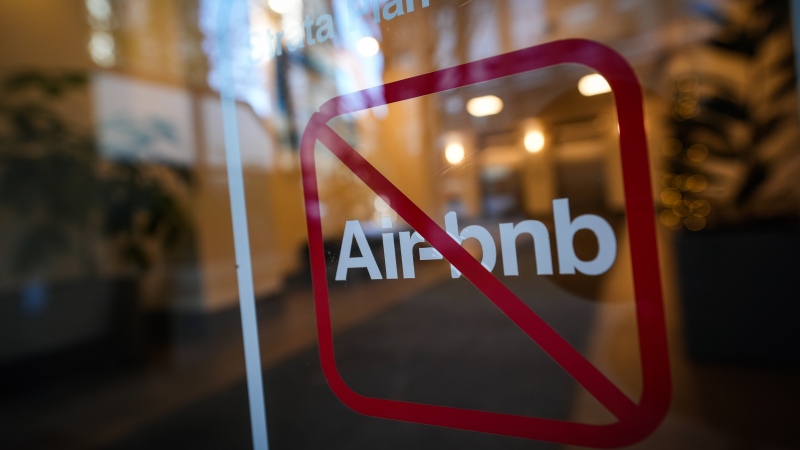 A sign indicating Airbnb rentals are not permitted is seen at the entrance to a condo tower, in Vancouver, on Thursday, November 23, 2023. THE CANADIAN PRESS/Darryl Dyck