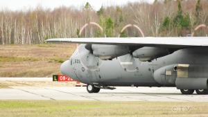 Friday morning, a Hercules CC-130 jet landed at the North Bay Jack Garland Airport. Crew members scrambled into action, unloading critical supplies from the Canadian Force Base in Kingston and putting the cargo into trucks for delivery. (Photo from video)