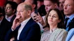 German Federal Chancellor Olaf Scholz, left and SPD lead candidate for the European elections, Katarina Barley, listen, during Party of European Socialists (PES) Democracy Congress, in Berlin, Saturday, May 4, 2024. (Christoph Soeder/dpa via AP)