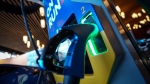 A DC fast charging station manufactured by Sumitomo Electric is seen at Fully Charged Live, an electric vehicle (EV), renewable and clean energy and urban mobility exhibition, in Vancouver, B.C., Friday, Sept. 8, 2023. THE CANADIAN PRESS/Darryl Dyck