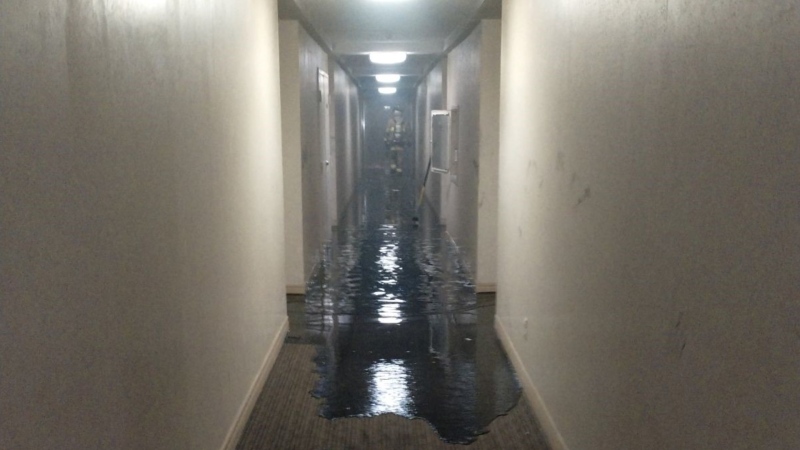 The sixth floor hallway of an Overbrook highrise after a fire broke out in a bedroom on Friday evening. (Natalie van Rooy/CTV News Ottawa)