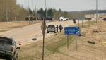 Emergency personnel can be seen on Highway 21 at the site of a serious crash near New Sarepta on May 4, 2024. (Dave Mitchell/CTV News Edmonton)