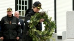 Princess Anne places a commemorative wreath following a tour at God's Acre cemetery at Esquimalt, B.C., on Saturday, May 4, 2024. THE CANADIAN PRESS/Chad Hipolito