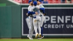 From left, Toronto Blue Jays Kevin Kiermaier, Daulton Varsho and George Springer celebrate after a baseball game against the Washington Nationals, Saturday, May 4, 2024, in Washington. (AP Photo/Nick Wass)