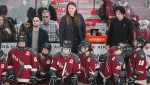 Montreal head coach Kori Cheverie, centre, looks on from the bench during third period PWHL hockey action against Toronto at the Bell Centre in Montreal, Saturday, April 20, 2024. (Graham Hughes, The Canadian Press)