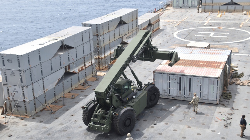 In this image provided by the U.S. Army, soldiers assigned to the 7th Transportation Brigade (Expeditionary) and sailors attached to the MV Roy P. Benavidez assemble the Roll-On, Roll-Off Distribution Facility (RRDF), or floating pier, off the shore of Gaza on April 26, 2024. (U.S. Army via AP)