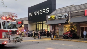 A red sedan was sent careening into a flower shop after it was hit by a suspected drunk driver at the Park & Tilford shopping centre in North Vancouver on Saturday evening. 