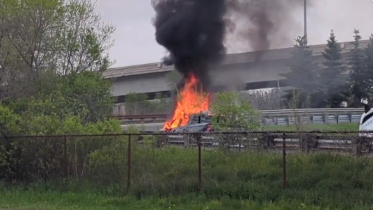A pickup truck burns near Highway 7/8 in Kitchener on May 5, 2024. (Dan Lauckener/CTV News)