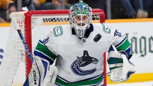 Vancouver Canucks goaltender Arturs Silovs (31) defends the goal against the Nashville Predators during the second period in Game 6 of an NHL hockey Stanley Cup first-round playoff series Friday, May 3, 2024, in Nashville, Tenn. (AP Photo/George Walker IV)