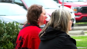 Dozens gathered in Pitt Meadows, B.C., on Sunday, May 5 to mark Red Dress Day. 