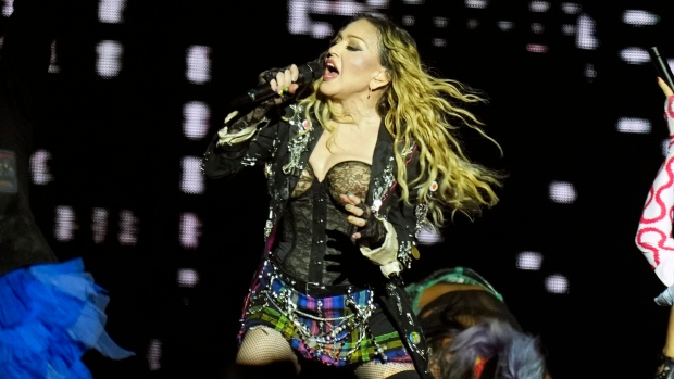 Madonna performs in the final show of her The Celebration Tour, on Copacabana Beach in Rio de Janeiro, Brazil. (AP Photo/Silvia Izquierdo)