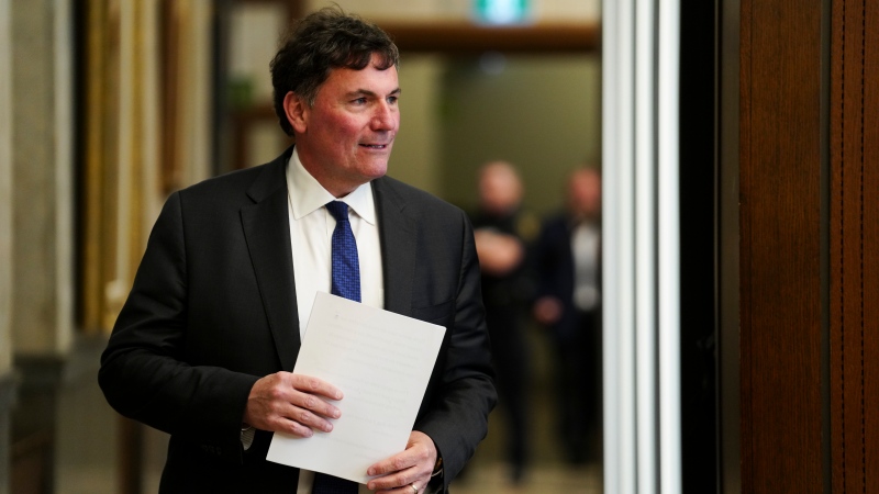 Minister of Public Safety, Democratic Institutions and Intergovernmental Affairs Dominic LeBlanc makes his way to react to the Initial Report from the Public Inquiry into Foreign Interference in Federal Electoral Processes and Democratic Institutions in the foyer of the House of Commons on Parliament Hill in Ottawa on Friday, May 3, 2024. THE CANADIAN PRESS/Sean Kilpatrick