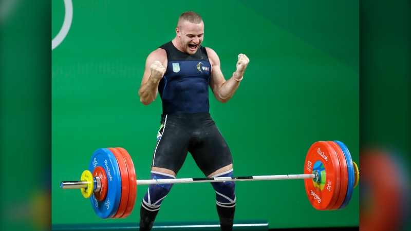 The Ukrainian Olympic Committee says two-time European weightlifting champion Oleksandr Pielieshenko has died on the front line in the war in Ukraine. (Mike Groll / The Associated Press)