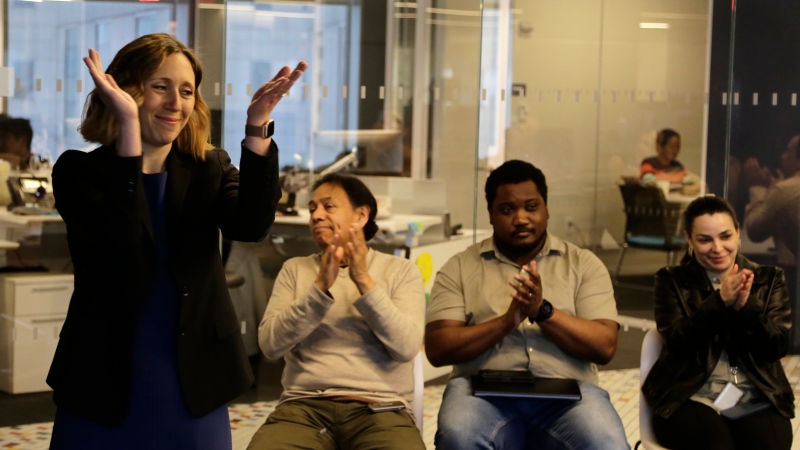 Executive Editor Julie Pace, left, reacts on Monday, May 6, 2024, in New York after it was announced that the Associated Press won the Pulitzer Prize for Feature Photography. (AP Photo/Peter Morgan)