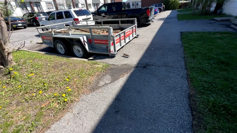 A rat scurries across the pavement outside Kylia White and Kelly O'Neill's Elmridge Gardens home. May 6, 2024. (Dave Charbonneau/CTV News Ottawa)