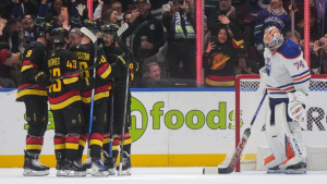 The Vancouver Canucks celebrate a goal against the Edmonton Oilers on Monday, November 6, 2023. THE CANADIAN PRESS/Darryl Dyck
