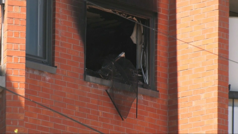 Woman in critical condition after apartment fire