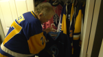 Joan Dietz has a closet full of Blades jerseys from over the years. (John Flatters / CTV News)