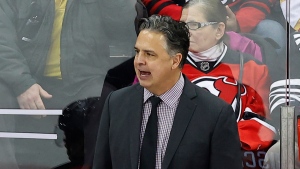 New Jersey Devils interim head coach Travis Green during the third period of an NHL hockey game against the Florida Panthers, Tuesday, March 5, 2024, in Newark, N.J. The Florida Panthers won 5-3. (Noah K. Murray/AP Photo) 