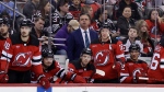 New Jersey Devils interim coach Travis Green watches the team's play against the Winnipeg Jets during the first period of an NHL hockey game Thursday, March 21, 2024, in Newark, N.J. (Adam Hunger/AP Photo) 