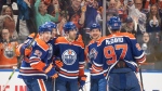 Edmonton Oilers' Ryan Nugent-Hopkins (93), Leon Draisaitl (29), Evan Bouchard (2), Zach Hyman (18) and Connor McDavid (97) celebrate a goal against the Los Angeles Kings during second period NHL playoff action in Edmonton on Wednesday May 1, 2024.THE CANADIAN PRESS/Jason Franson
