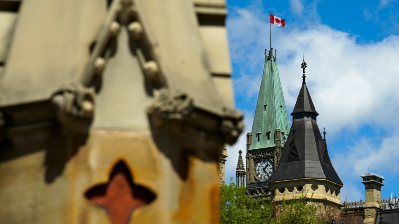 The Peace Tower on Parliament Hill is pictured from the West Gate in Ottawa on Monday, May 6, 2024. THE CANADIAN PRESS/Sean Kilpatrick