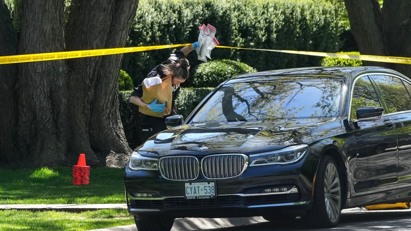Toronto Police investigate a crime scene outside the mansion of Canadian rap mogul Drake in Toronto's Bridle Path neighbourhood, Tuesday, May 7, 2024. 

(THE CANADIAN PRESS/Nathan Denette)