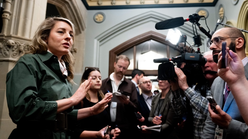 Minister of Foreign Affairs Mélanie Joly speaks to reporters before a cabinet meeting on Parliament Hill in Ottawa, on Tuesday, May 7, 2024. THE CANADIAN PRESS/Spencer Colby 