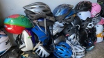 A collection of bicycle helmets is pictured. (Source: Derek Haggett/CTV News Atlantic)