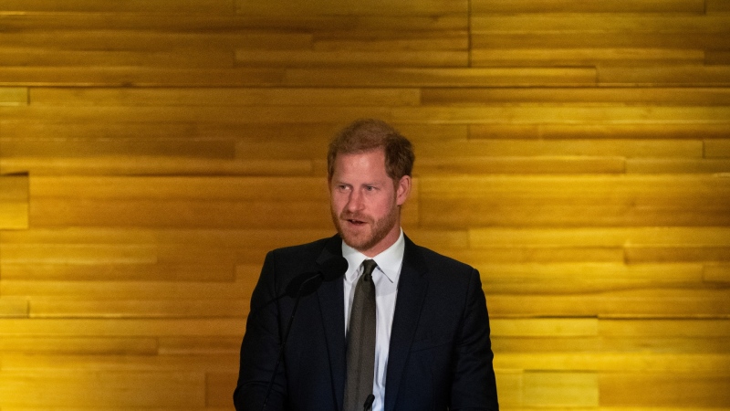 Prince Harry, the Duke of Sussex speaks during the "One Year to Go" Invictus Games dinner in Vancouver, Feb. 16, 2024. THE CANADIAN PRESS/Ethan Cairns