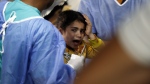 Palestinian medics treat a girl wounded in the Israeli bombardment of the Gaza Strip at the Kuwaiti Hospital in a Rafah refugee camp. (AP Photo/Ramez Habboub/AP Photo)