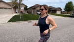 Ashley Bigelow runs in her Lakeshore neighbourhood on May 7, 2024. She’s planning a run for ovarian cancer this Mother’s Day outside the Atlas Tube Centre in Lakeshore, Ont. (Rich Garton/CTV News Windsor)