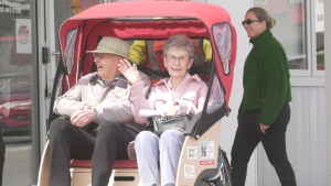 Cycling Without Age uses ‘trishaws’ to transport seniors around the city. (Mike McDonald/CTV News)