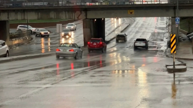 WATCH: A new warning system aimed at helping drivers avoid flooding under the Albert St. underpass was put to work.