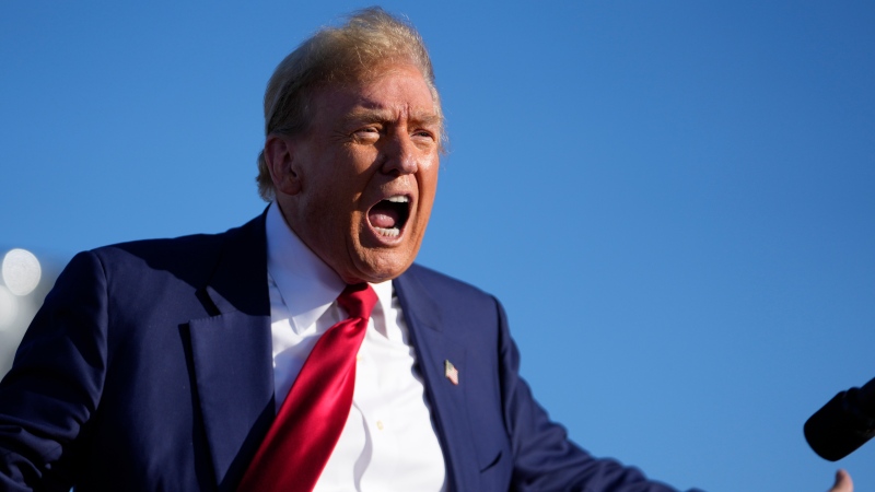 Republican presidential candidate former President Donald Trump reacts at a campaign rally in Freeland, Mich., May 1, 2024. (AP Photo/Paul Sancya, File) 