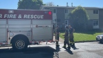 Firefighters at a fire in the 10100 block of Shenandoah Crescent in Windsor, Ont., on Wednesday, May 8, 2024. (CTV News Windsor) 